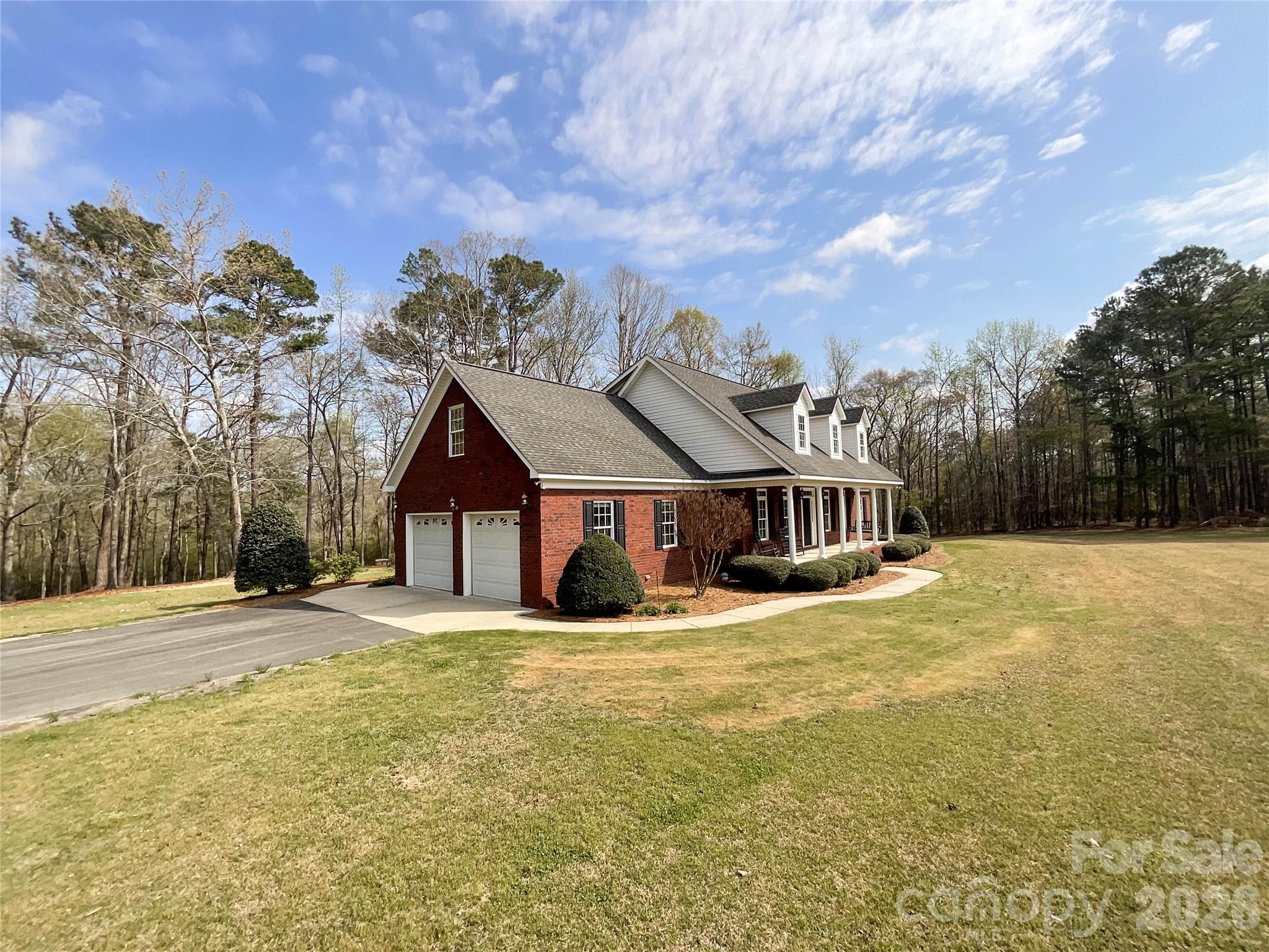 62 Will Evans Road Jefferson, SC 29718 - Photo 3 of 48 a big house with large trees in front of it