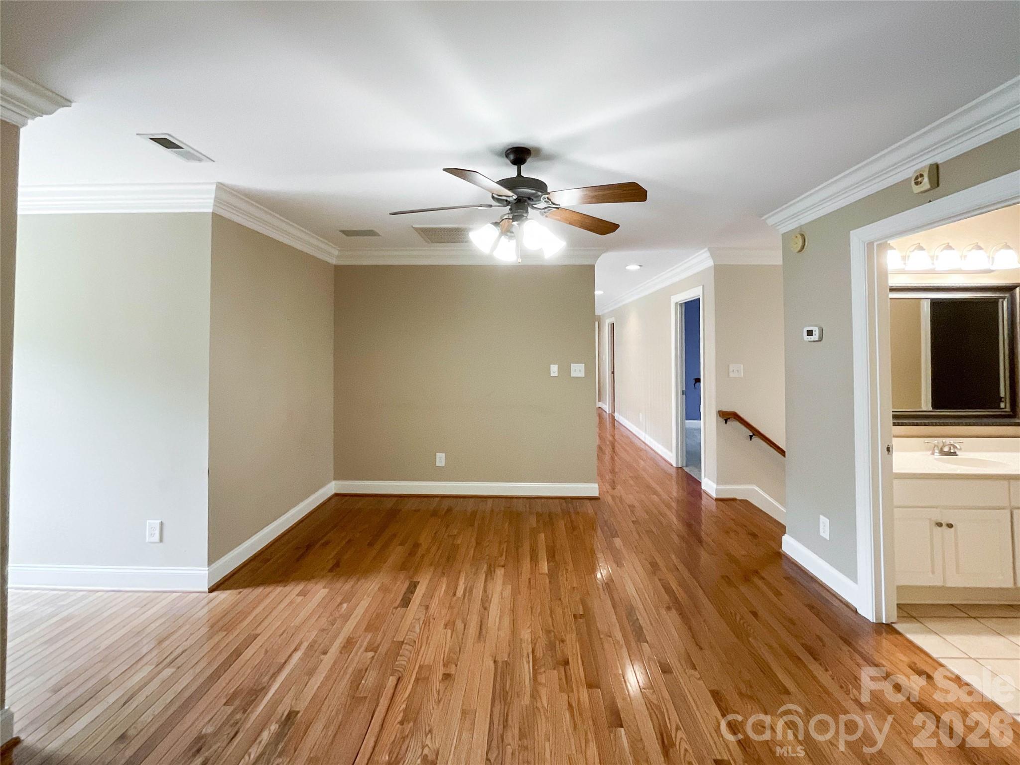 62 Will Evans Road Jefferson, SC 29718 - Photo 31 of 48 wooden floor in an empty room with a window
