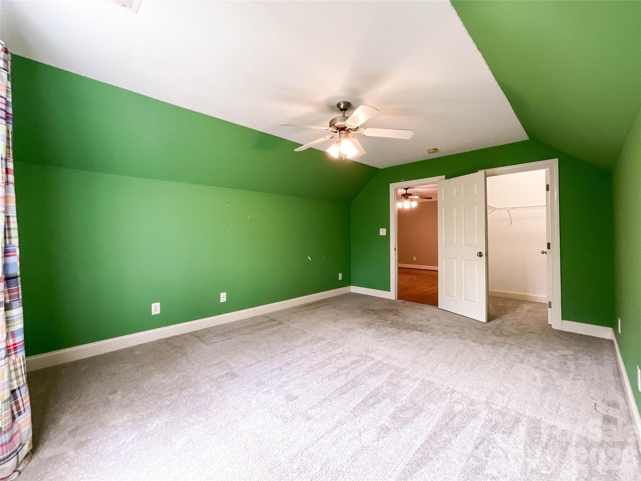 62 Will Evans Road Jefferson, SC 29718 - Photo 33 of 48 a view of a big room with closet and chandelier fan