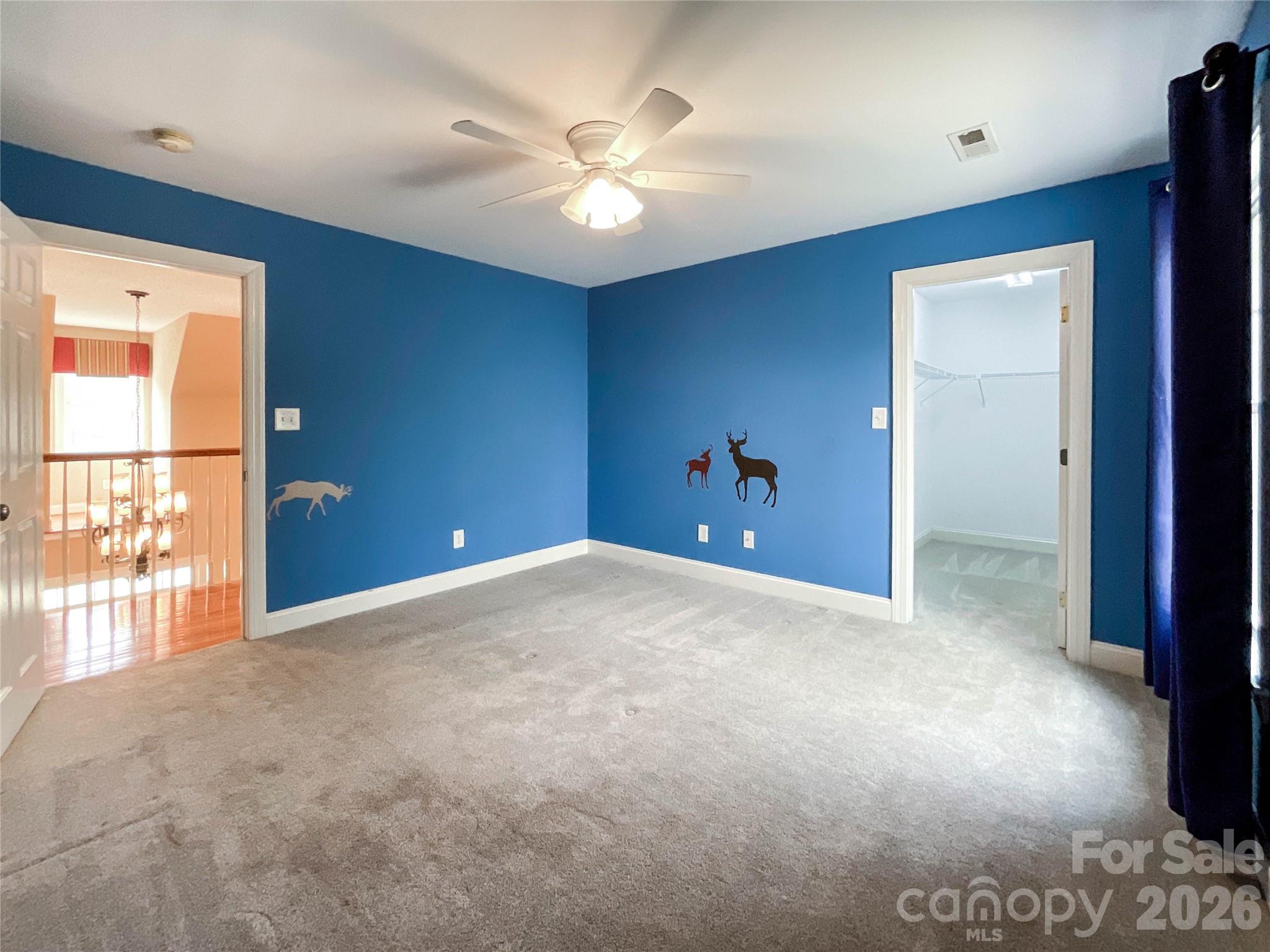 62 Will Evans Road Jefferson, SC 29718 - Photo 39 of 48 a view of a livingroom with a ceiling fan and window
