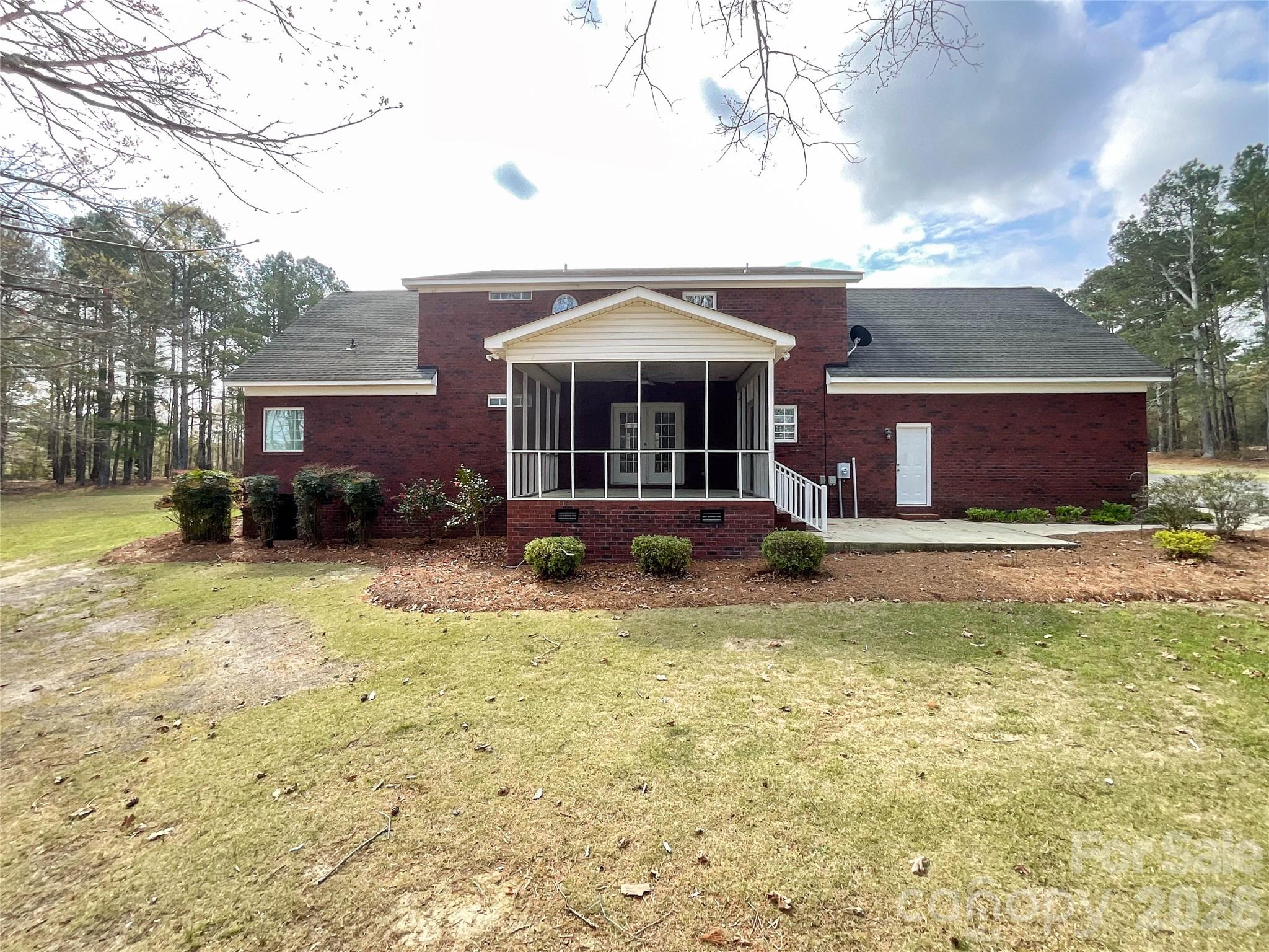 62 Will Evans Road Jefferson, SC 29718 - Photo 45 of 48 a front view of a house with a yard