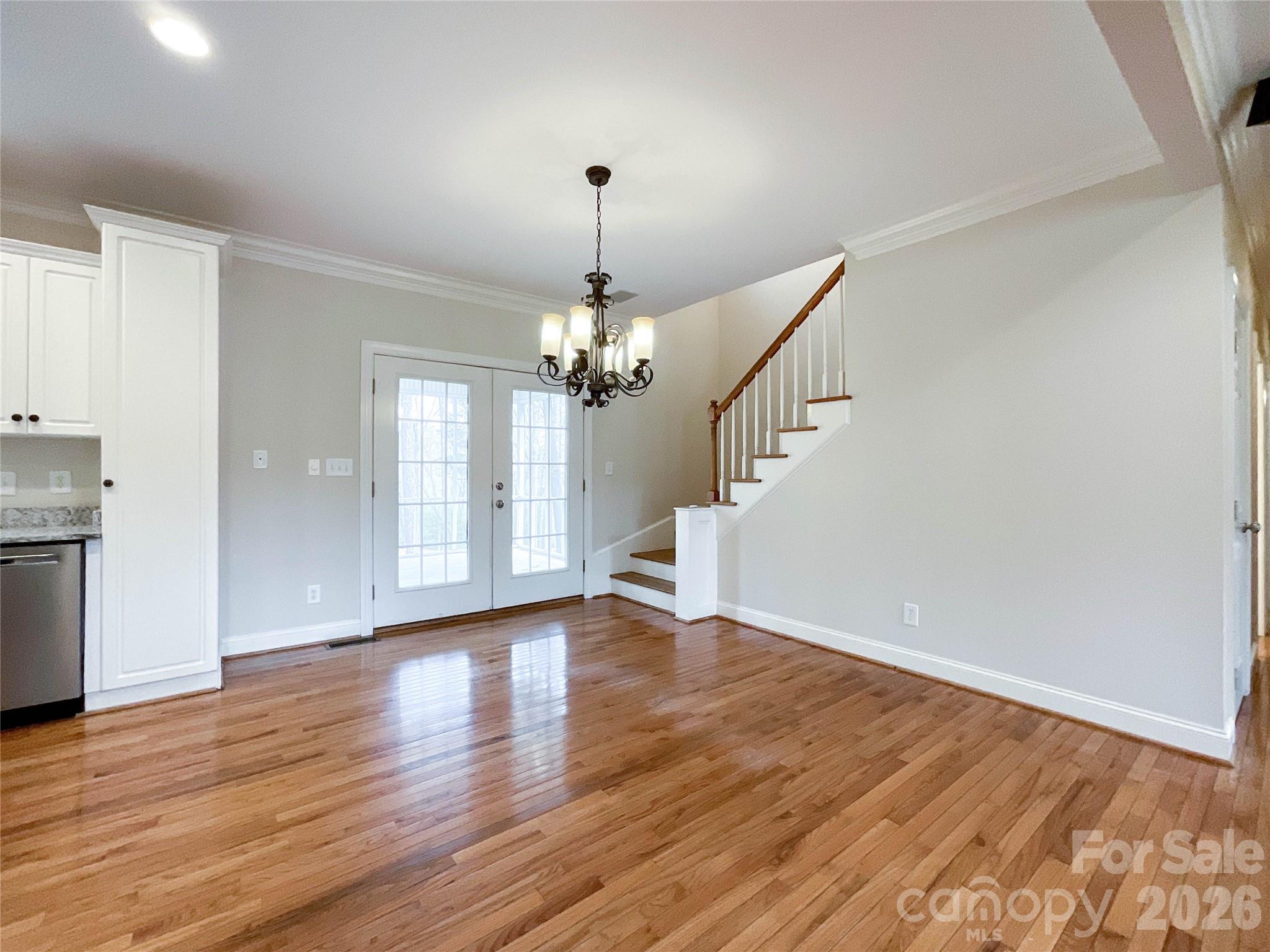 62 Will Evans Road Jefferson, SC 29718 - Photo 8 of 48 a view of an empty room with wooden floor and a window