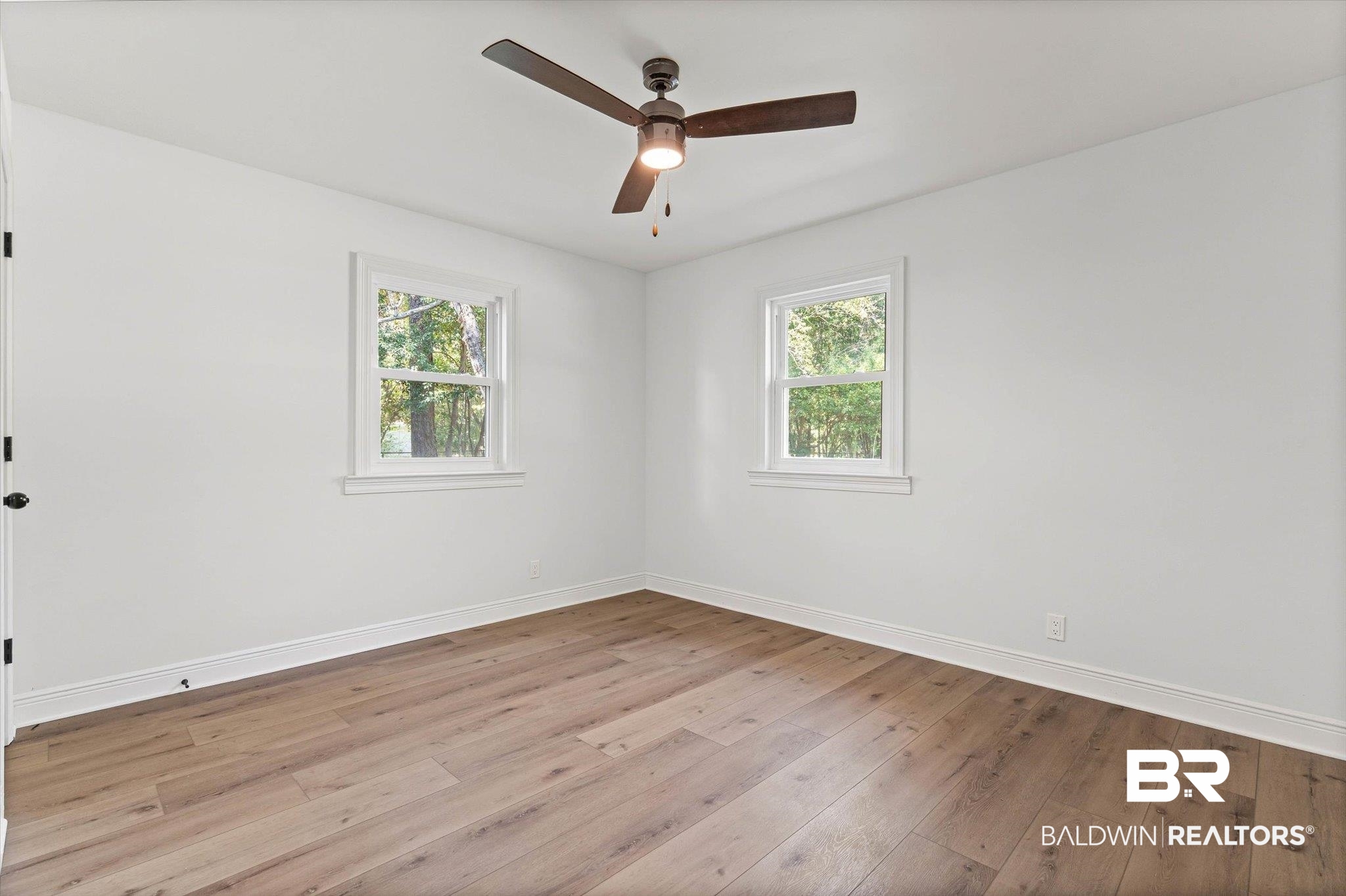 4156 Furman Drive Mobile, AL 36619 - Photo 13 of 24 Spare room featuring light wood finished floors and ceiling fan