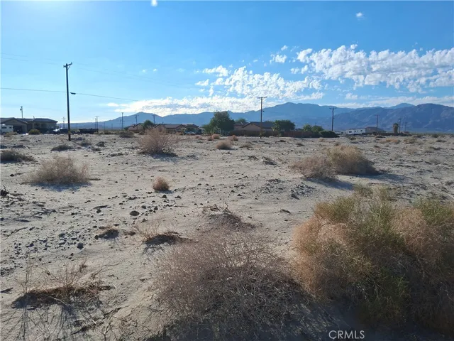 a view of a backyard of a house