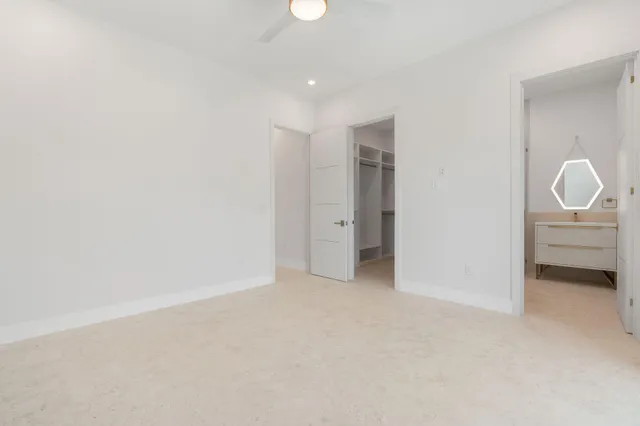 a view of backyard with swimming pool