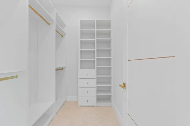 a view of a house with a yard and garden