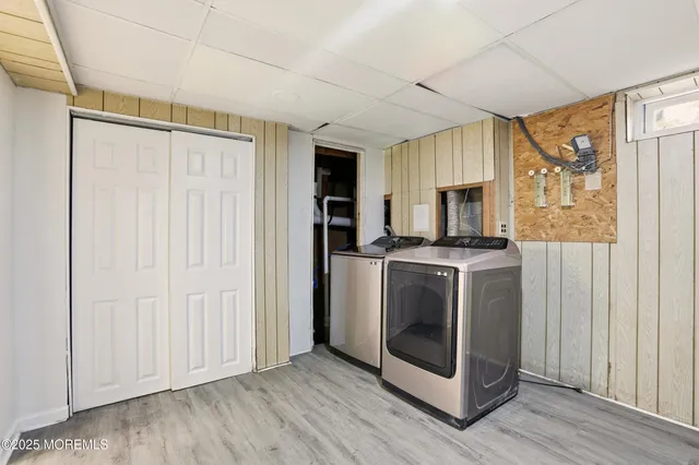 a view of a kitchen with electric appliances