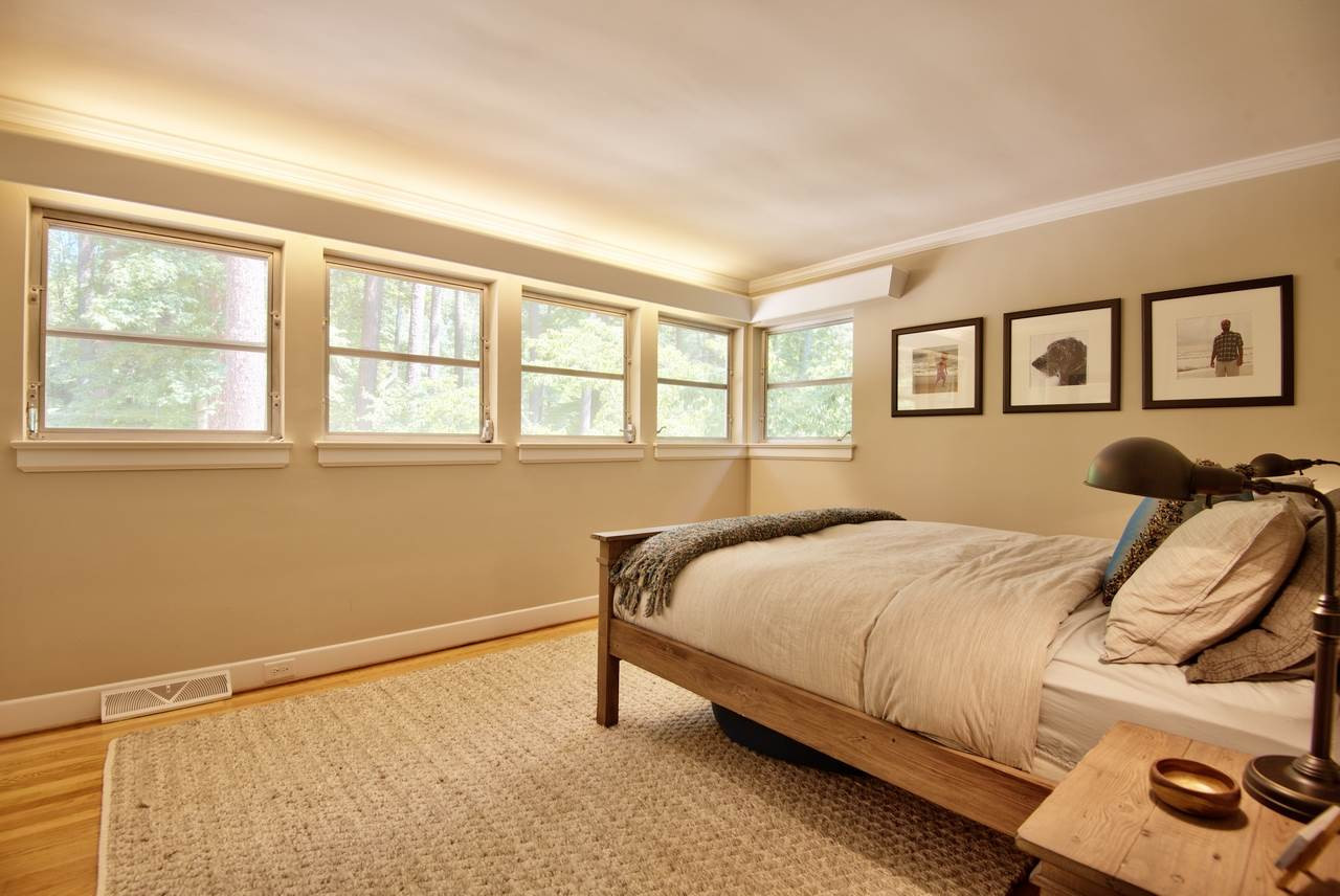 1207 Woodburn Road Durham, NC 27705 - Photo 11 of 25 Light & airy bedroom with original louvered Jalousie windows. Master Bedroom