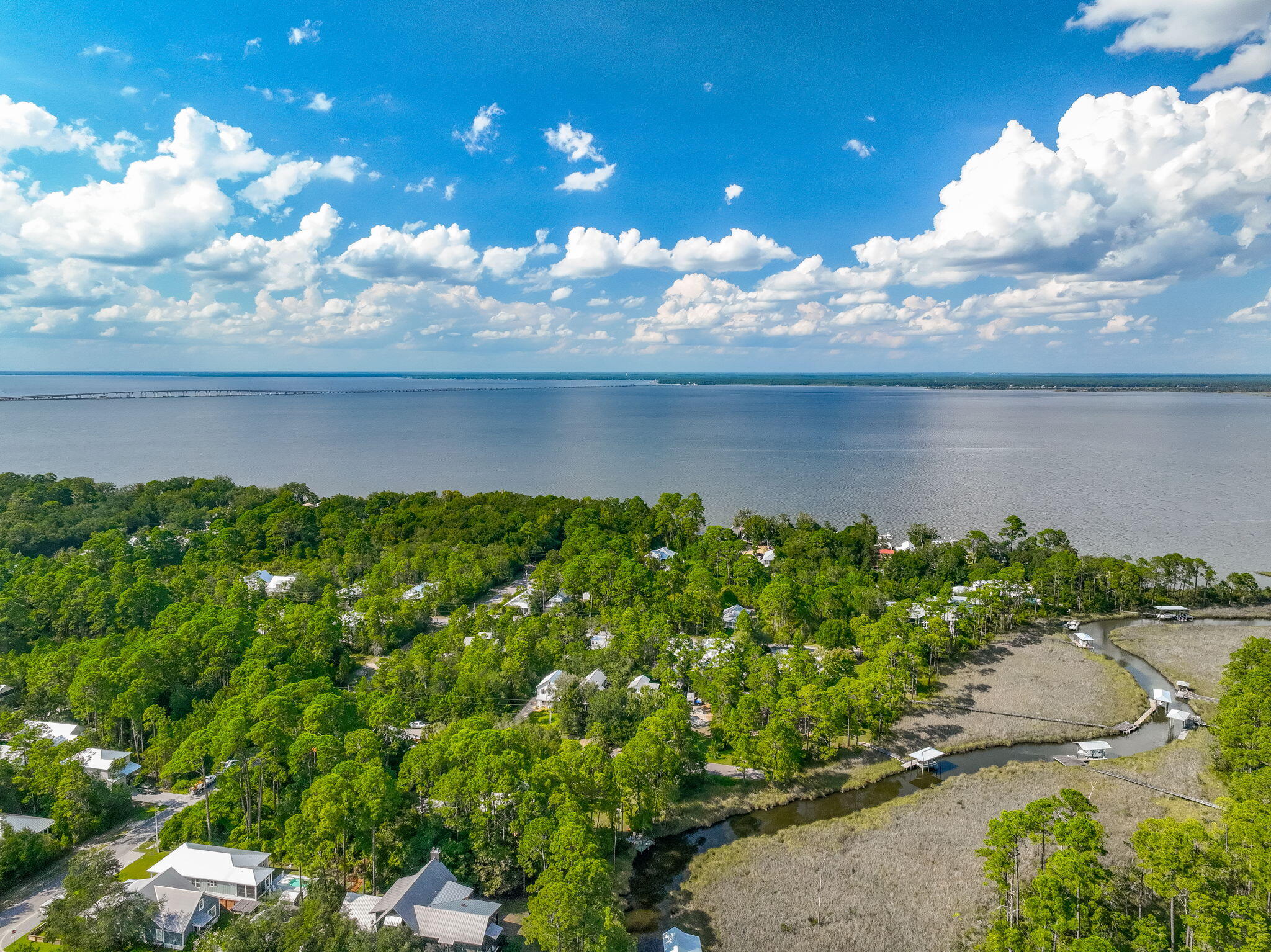 Lot 7 South Magnolia Beach Way Santa Rosa Beach, FL 32459 - Photo 12 of 21 a view of a lake with a yard