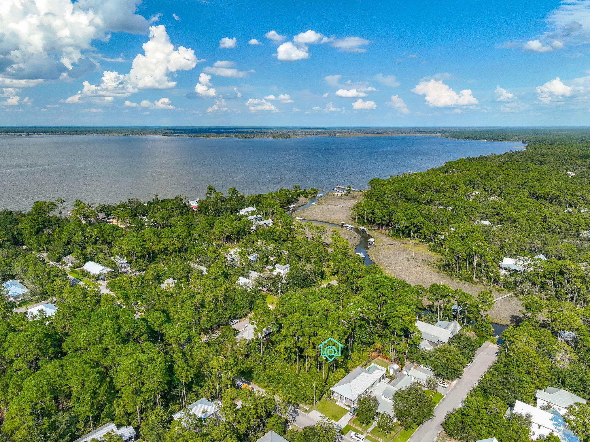 Lot 7 South Magnolia Beach Way Santa Rosa Beach, FL 32459 - Photo 2 of 21 a view of a lake from a yard