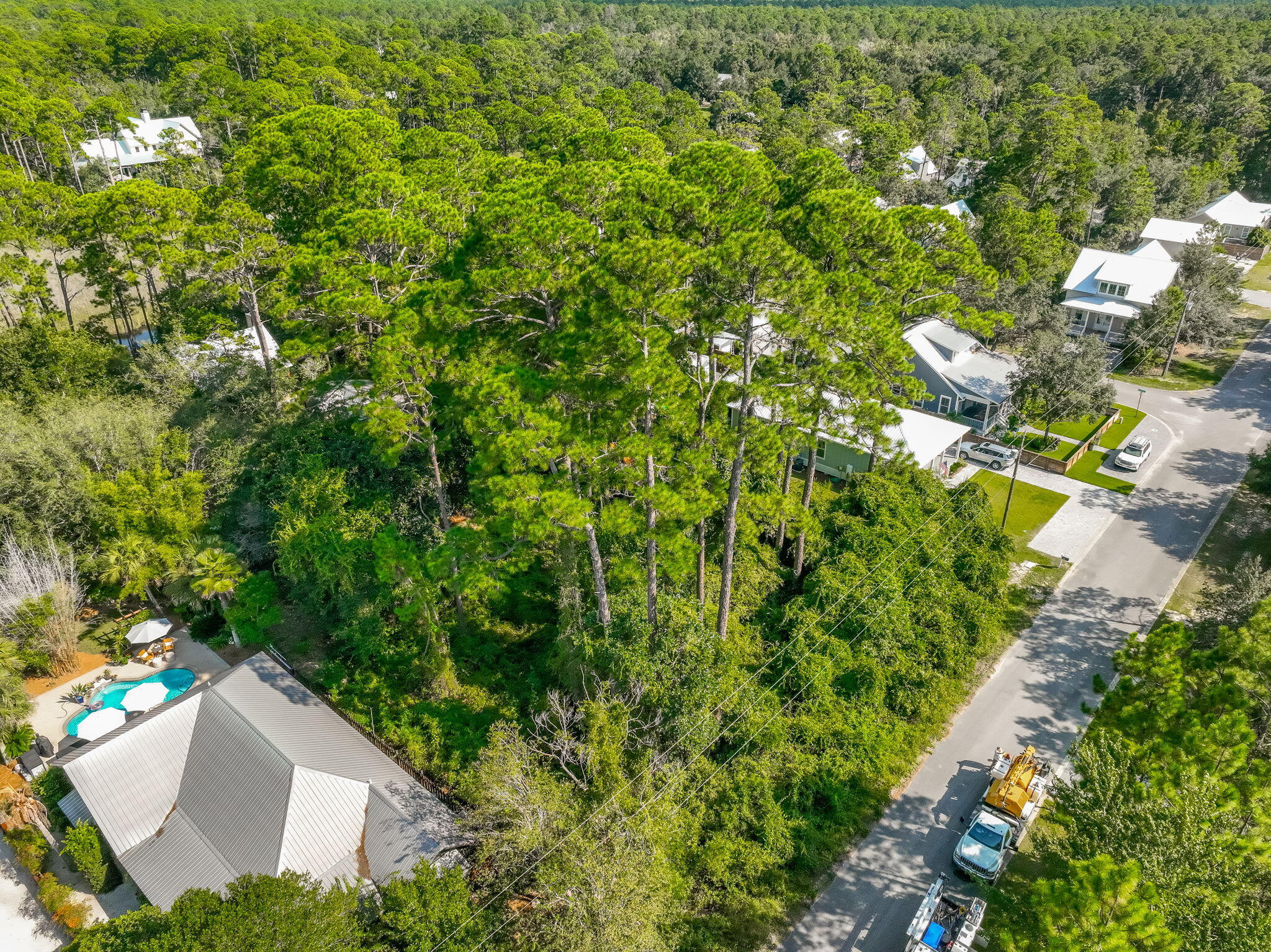 Lot 7 South Magnolia Beach Way Santa Rosa Beach, FL 32459 - Photo 5 of 21 an aerial view of a house with a yard and swimming pool