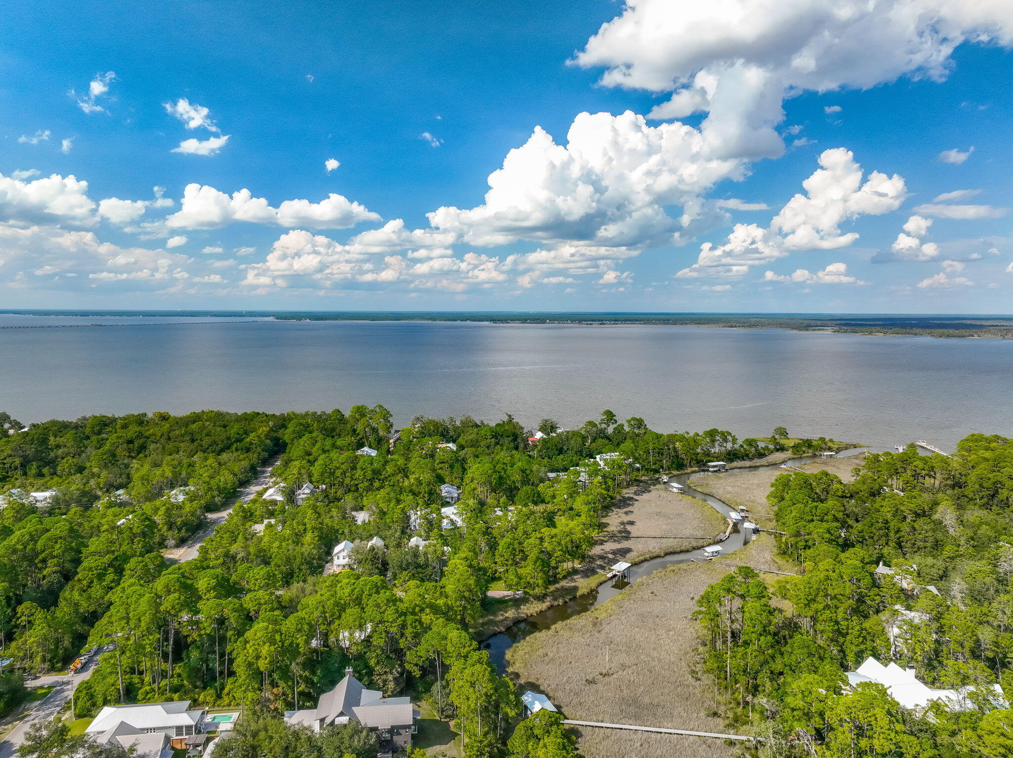 Lot 7 South Magnolia Beach Way Santa Rosa Beach, FL 32459 - Photo 6 of 21 a view of a lake from a yard