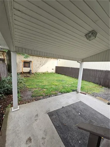 a view of a backyard with plants