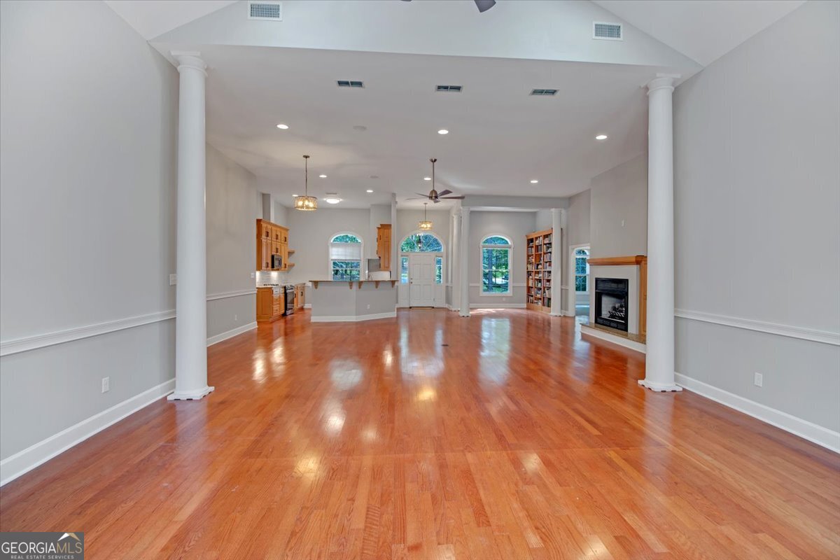 396 Meander Trace Thomasville, GA 31792 - Photo 24 of 50 a view of kitchen with cabinets and wooden floor