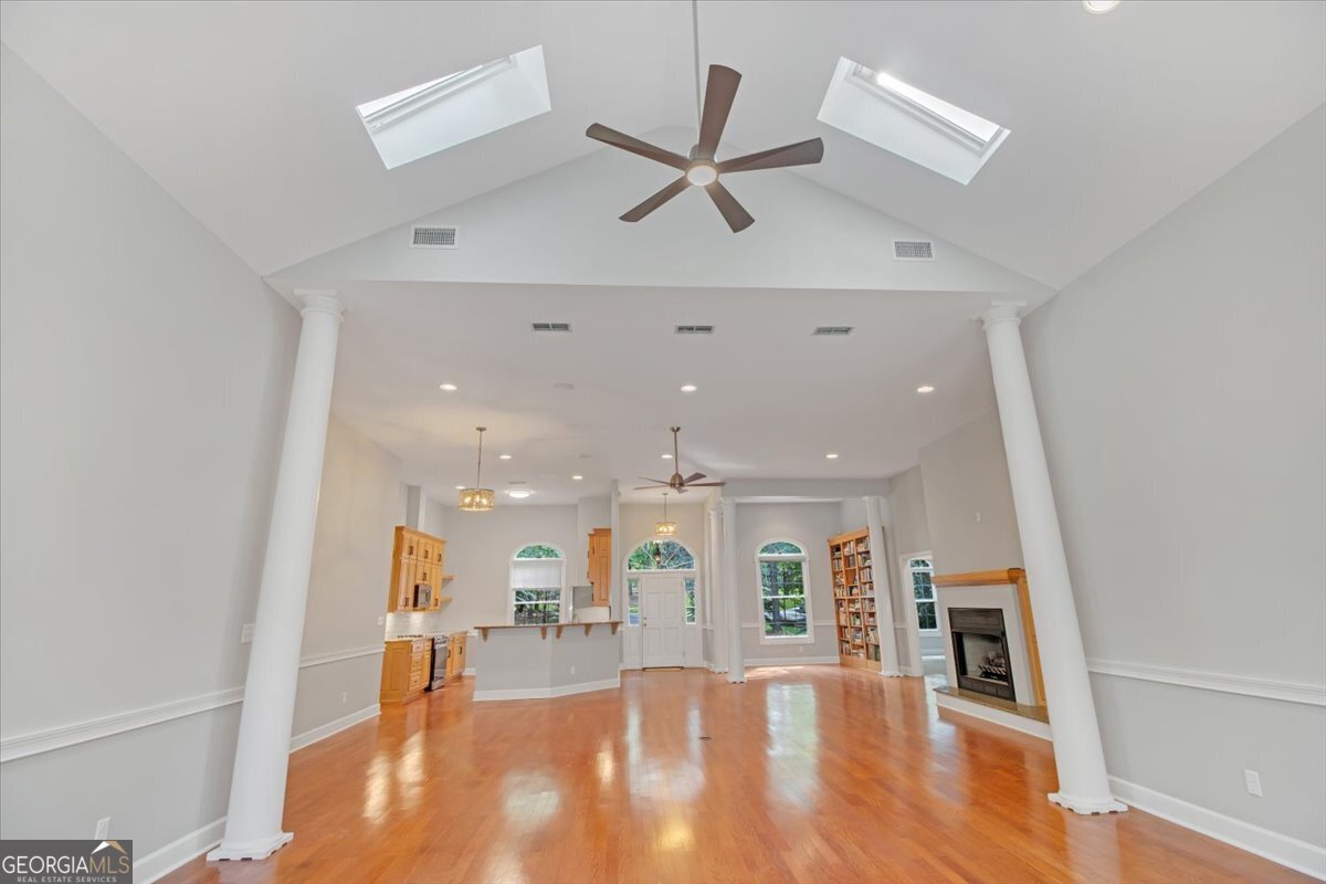 396 Meander Trace Thomasville, GA 31792 - Photo 25 of 50 a living room with furniture and a wooden floor