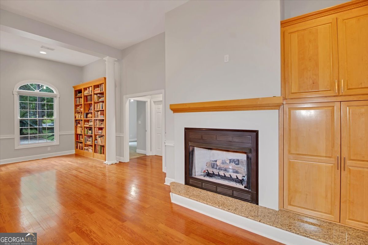 396 Meander Trace Thomasville, GA 31792 - Photo 30 of 50 a view of an empty room with a fireplace and a window
