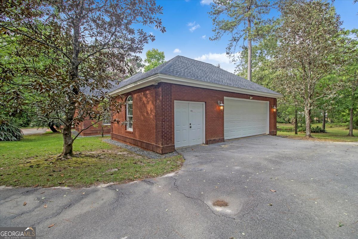 396 Meander Trace Thomasville, GA 31792 - Photo 39 of 50 a house with yard in front of it