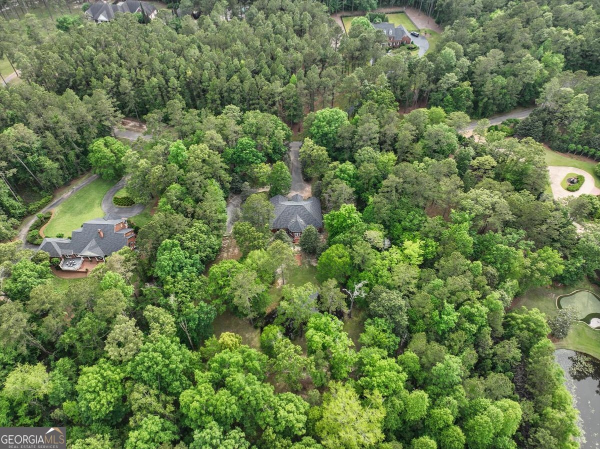 396 Meander Trace Thomasville, GA 31792 - Photo 42 of 50 an aerial view of residential house with outdoor space and trees all around