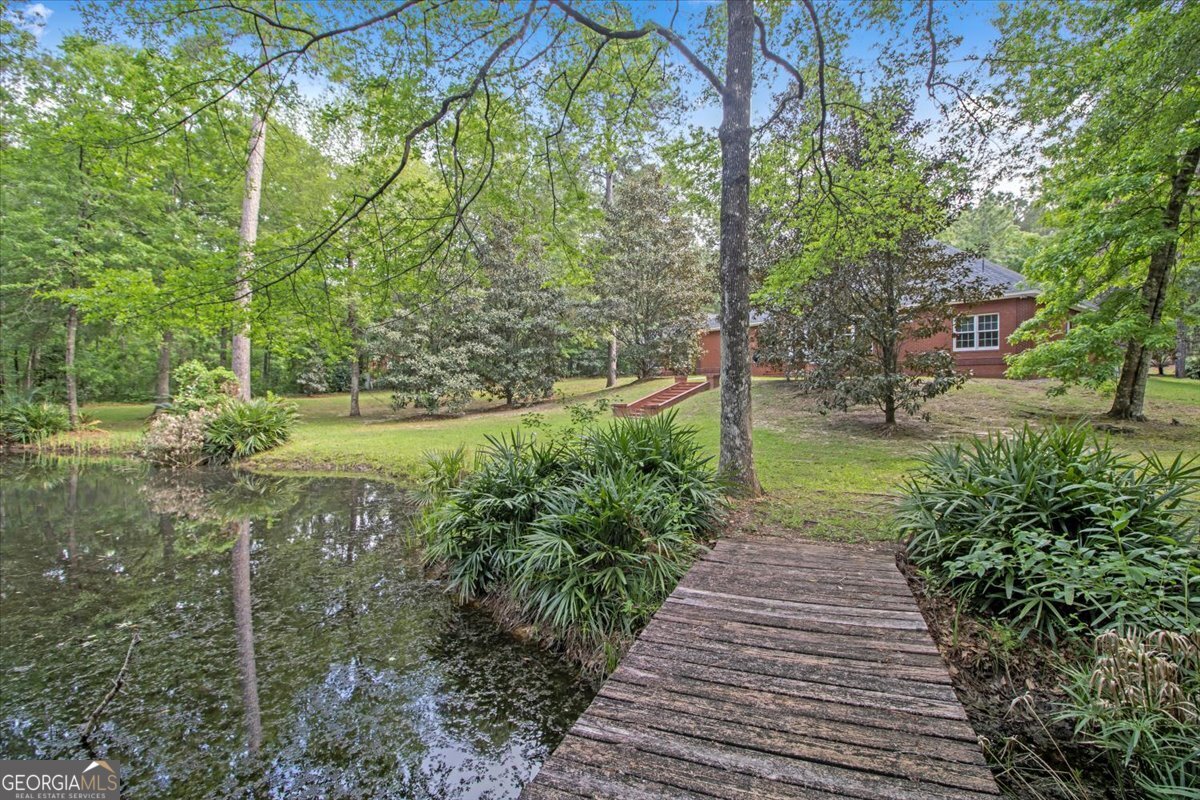 396 Meander Trace Thomasville, GA 31792 - Photo 46 of 50 a view of a backyard