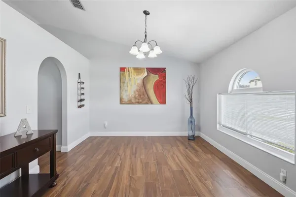 a view of dining room with wooden floor