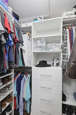 a bathroom with a double vanity sink and mirror