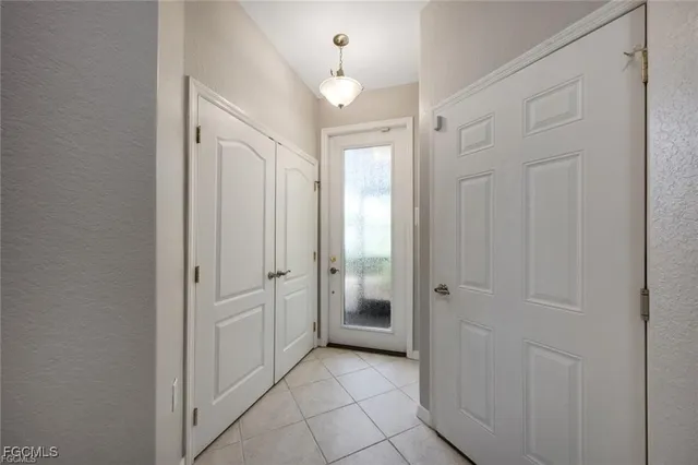 a bathroom with a shower and a sink