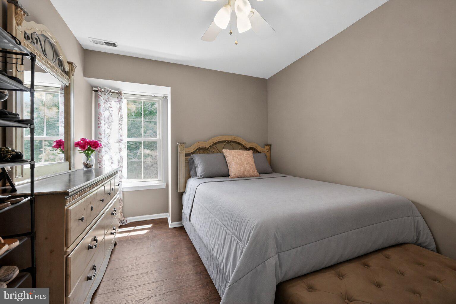 213 Tavistock Road Cherry Hill, NJ 08034 - Photo 15 of 24 a bedroom with a bed and a window