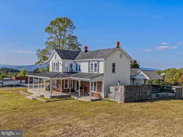 a view of a house with a roof deck