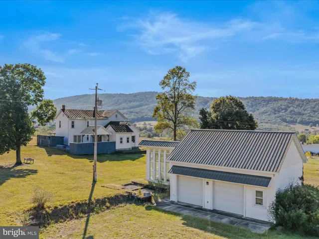 a view of a swimming pool and outside space