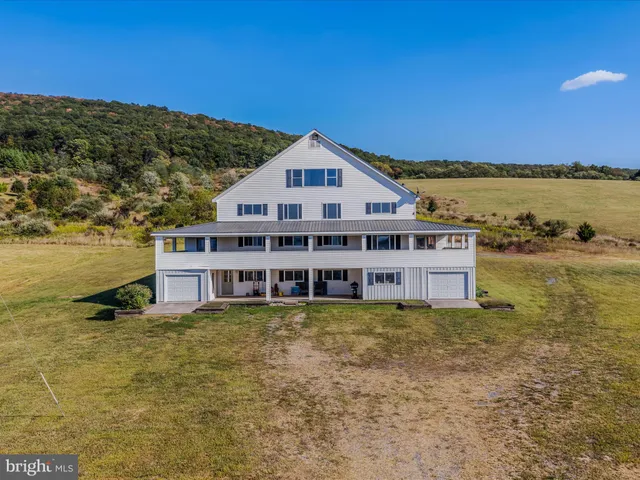 a view of a house with a ocean view