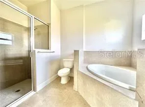 a bathroom with a sink and a shower