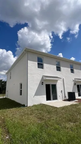 a view of a front of house with garage