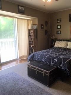 64 Grant Road Litchfield, ME 04350 - Photo 12 of 16 Master bedroom with patio doors with...