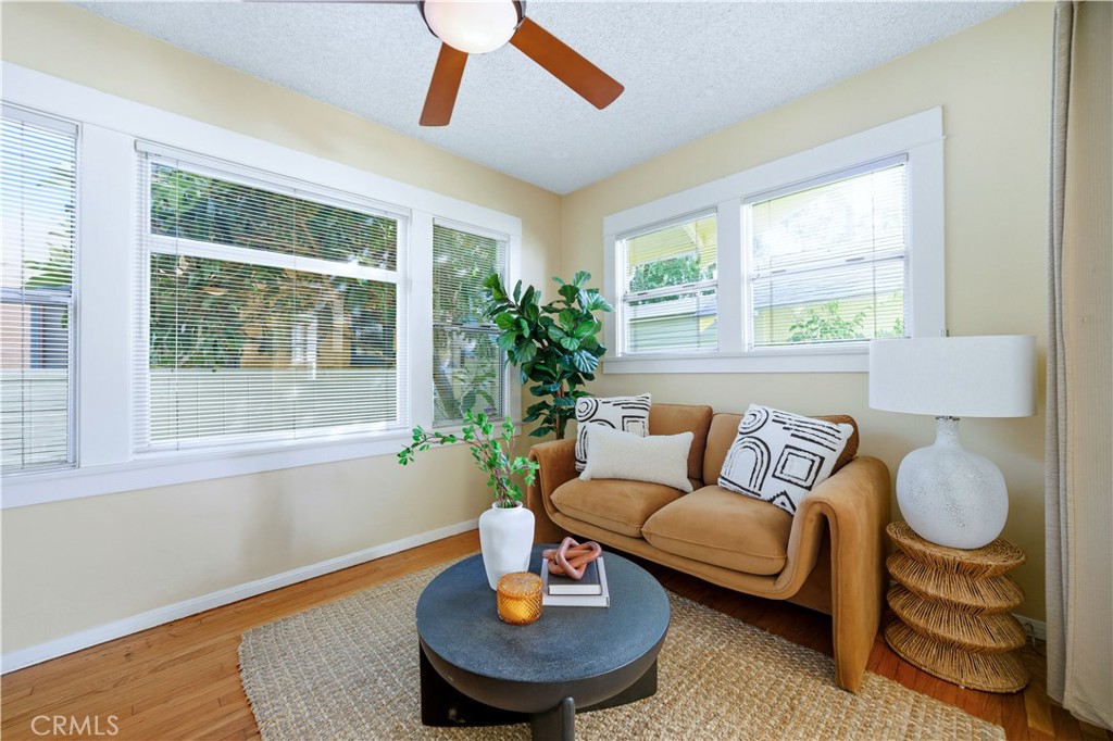347 Euclid Avenue Long Beach, CA 90814 - Photo 11 of 41 a living room with furniture and a window