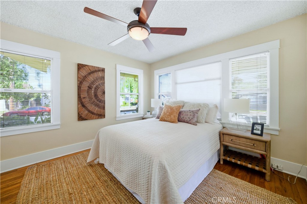 347 Euclid Avenue Long Beach, CA 90814 - Photo 12 of 41 a bedroom with a bed dresser and a window