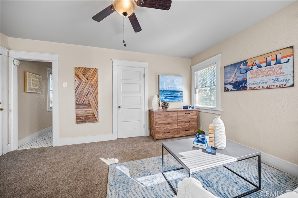 347 Euclid Avenue Long Beach, CA 90814 - Photo 26 of 41 a living room with furniture and a rug