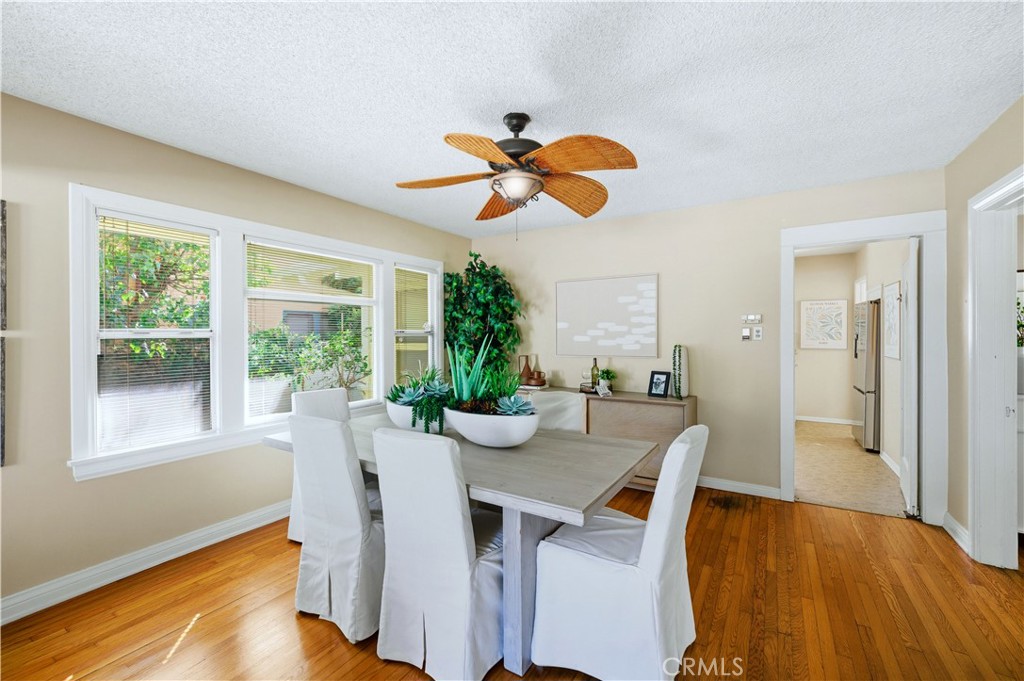 347 Euclid Avenue Long Beach, CA 90814 - Photo 4 of 41 a view of a dining room with furniture window and wooden floor