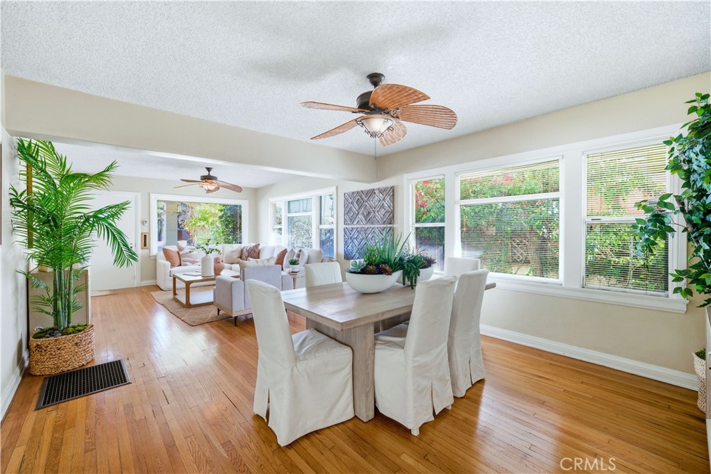 347 Euclid Avenue Long Beach, CA 90814 - Photo 5 of 41 a view of a dining room with furniture window and wooden floor