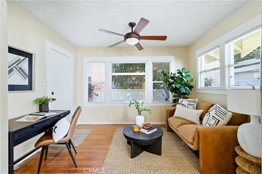 347 Euclid Avenue Long Beach, CA 90814 - Photo 9 of 41 a living room with furniture and a large window