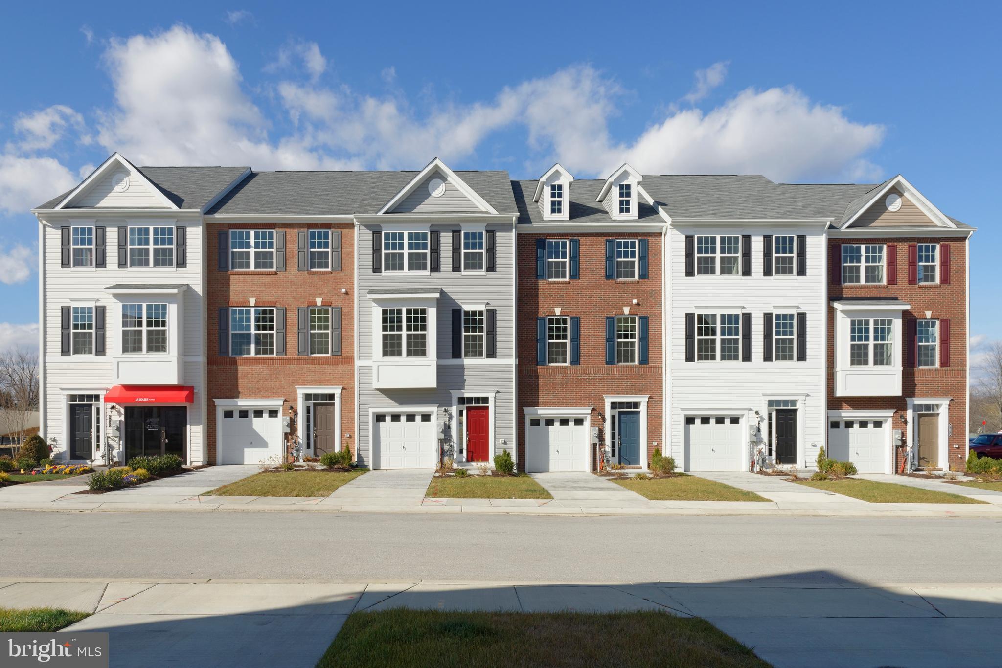 908 Sandy Run Road Middle River, MD 21220 - Photo 1 of 24 a front view of residential houses with street