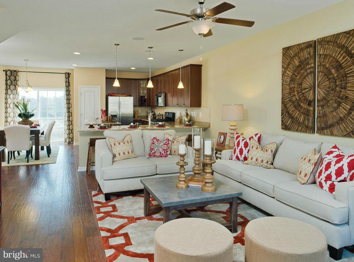 908 Sandy Run Road Middle River, MD 21220 - Photo 2 of 24 a living room with furniture and wooden floor