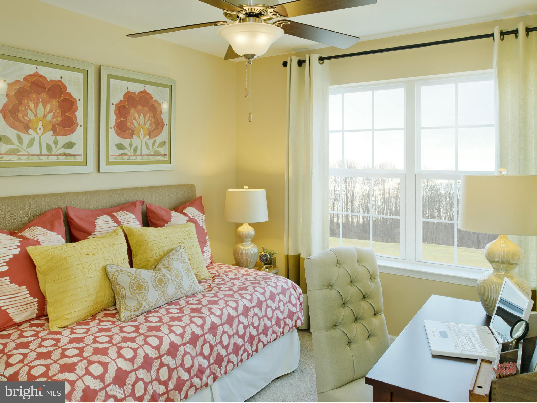 908 Sandy Run Road Middle River, MD 21220 - Photo 12 of 24 a bedroom with a bed and a window