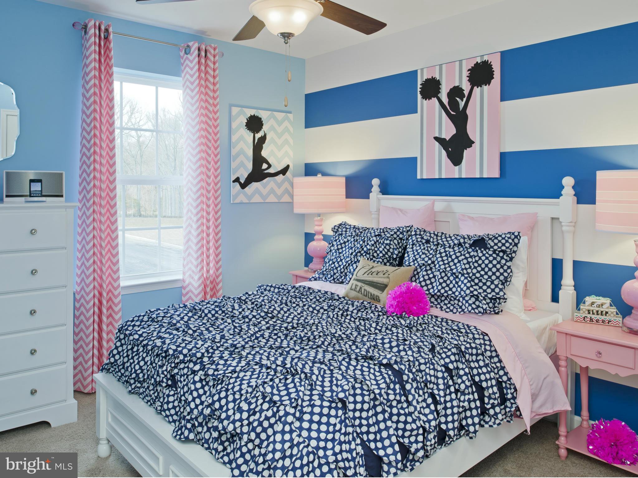 908 Sandy Run Road Middle River, MD 21220 - Photo 13 of 24 a bedroom with a bed and a dresser