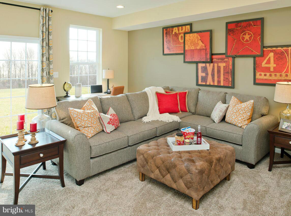 908 Sandy Run Road Middle River, MD 21220 - Photo 14 of 24 a living room with furniture and a large window