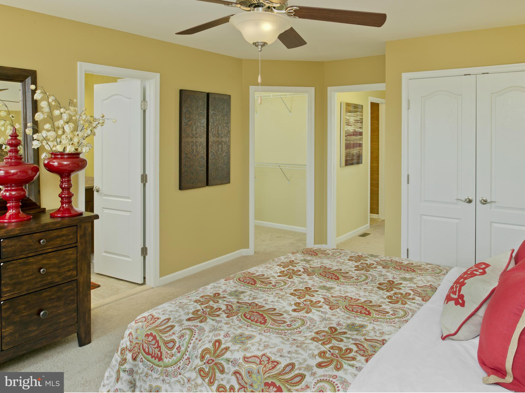 908 Sandy Run Road Middle River, MD 21220 - Photo 10 of 24 a bedroom with a bed and a dresser