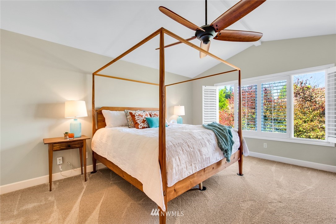 3613 209th Place Southeast Bothell, WA 98021 - Photo 15 of 28 a bed sitting in a bedroom next to a window