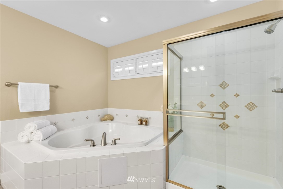 3613 209th Place Southeast Bothell, WA 98021 - Photo 18 of 28 a bathroom with a tub and shower
