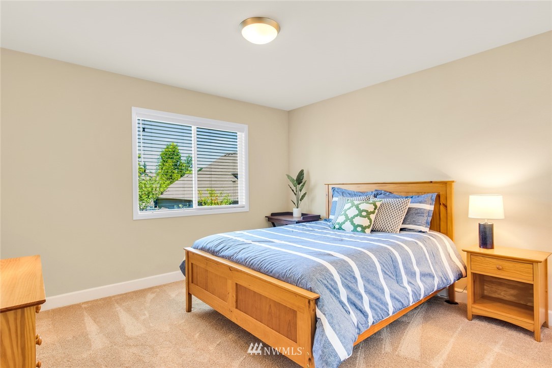 3613 209th Place Southeast Bothell, WA 98021 - Photo 20 of 28 a bedroom with a bed and window