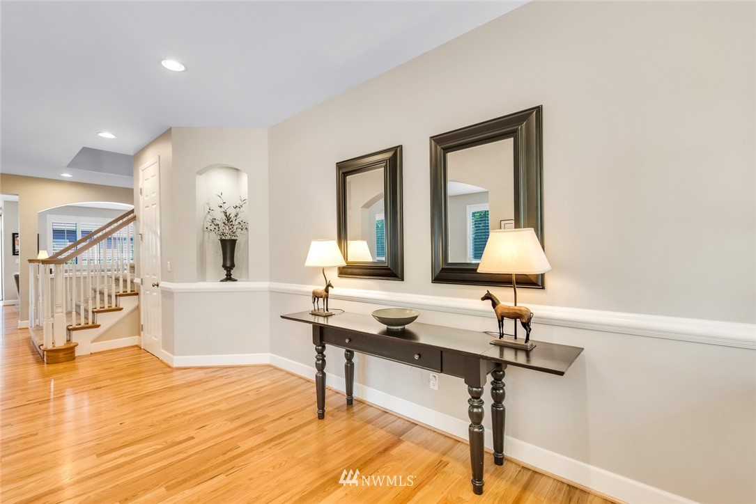 3613 209th Place Southeast Bothell, WA 98021 - Photo 3 of 28 a view of a room with a table and chairs