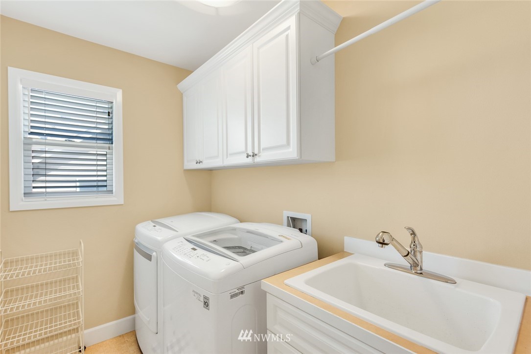 3613 209th Place Southeast Bothell, WA 98021 - Photo 22 of 28 a utility room with dryer and washer
